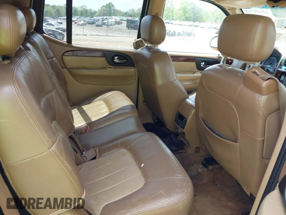 2003 GMC Envoy SLE with VIN 1GKES16S136153880, listed as a IAAI auction lot 42009798 with 289,208 mi miles and . Bid and sale history available at DreamBid. Image 8.