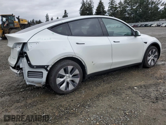 2023 Tesla Model Y Long Range z VIN 7SAYGDEE4PF836872, wystawiony jako Copart lot #45566235 z przebiegiem 7 674 mil mil oraz Szkoda całkowita • Salvage title. Historia ofert i sprzedaży dostępna na DreamBid. Obrazek 3.