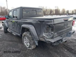 2021 Jeep Gladiator Willys with VIN 1C6HJTAGXML502037, listed as a IAAI auction lot 41225448 with 53,154 mi miles and . Bid and sale history available at carsss.com. Image 3.
