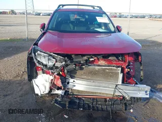2021 Toyota RAV4 XLE Premium with VIN 2T3C1RFV1MW145048, listed as a IAAI auction lot 41018272 with 61,959 mi miles and . Bid and sale history available at DreamBid. Image 6.