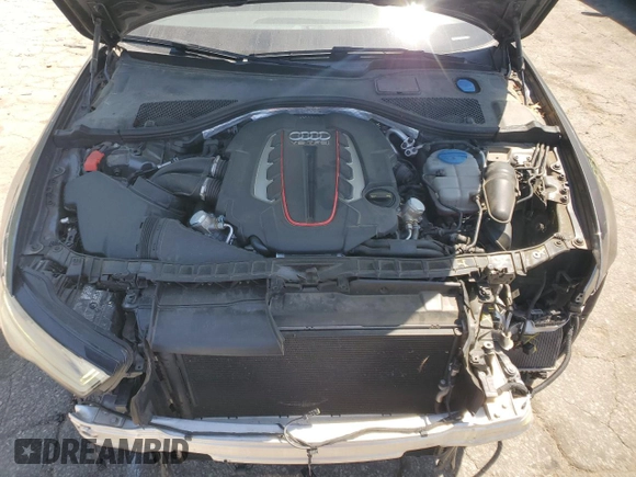 2017 Audi S6 Premium Plus z VIN WAUFFAFCXHN012281, wystawiony jako Copart lot #53571455 z przebiegiem 67 439 mil mil oraz Szkoda całkowita • Salvage title. Historia ofert i sprzedaży dostępna na DreamBid. Obrazek 11.