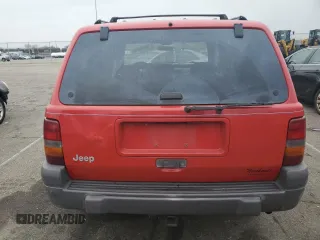1996 Jeep Grand Cherokee Laredo with VIN 1J4GZ58S7TC292217, listed as a Copart auction lot 80757904 with 156,041 mi miles and Salvage Title. Bid and sale history available at carsss.com. Image 6.