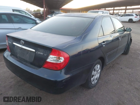 2004 Toyota Camry LE with VIN 4T1BE32K54U260916, listed as a IAAI auction lot 42052542 with 260,721 mi miles and . Bid and sale history available at carsss.com. Image 4.