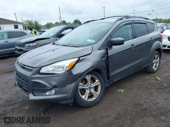 2013 Ford Escape SE with VIN 1FMCU9GX9DUA57901, listed as a IAAI auction lot 42367615 with 140,000 mi miles and . Bid and sale history available at DreamBid. Image 2.