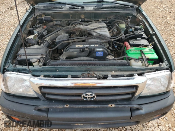2000 Toyota Tacoma with VIN 4TAWN72N8YZ677345, listed as a Copart auction lot 61096865 with 217,590 mi miles and Clean title. Bid and sale history available at DreamBid. Image 11.
