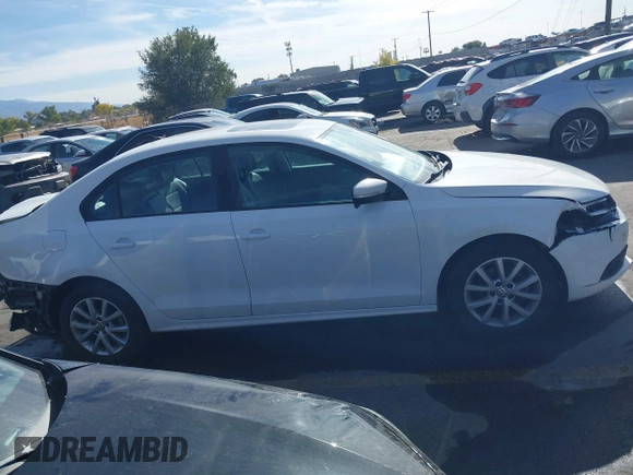 2012 Volkswagen Jetta Sedan SE w/Convenience with VIN 3VWDX7AJ7CM377081, listed as a IAAI auction lot 40756653 with 120,019 mi miles. Bid and sale history available at carsss.com. Image 14.