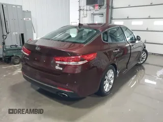 2016 Kia Optima LX with VIN 5XXGT4L3XGG073744, listed as a IAAI auction lot 41586212 with 111,628 mi miles. Bid and sale history available at carsss.com. Image 4.