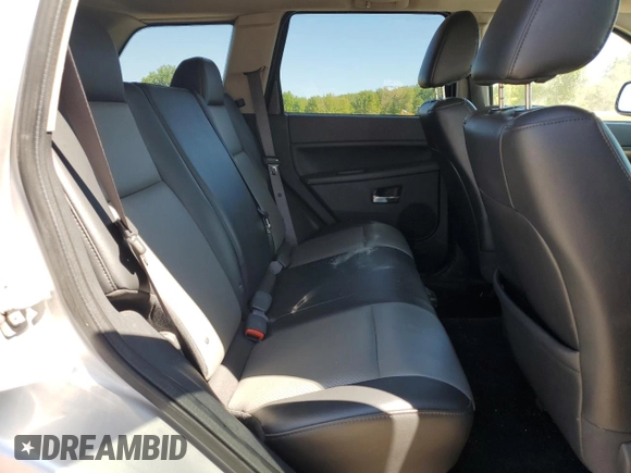 2009 Jeep Grand Cherokee Laredo with VIN 1J8HR48P29C537653, listed as a Copart auction lot 70190404 with 192,796 mi miles and Salvage Title. Bid and sale history available at carsss.com. Image 12.