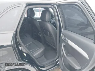 2017 Audi Q3 Premium with VIN WA1BCCFSXHR012345, listed as a IAAI auction lot 41589844 with 125,044 mi miles and . Bid and sale history available at DreamBid. Image 8.