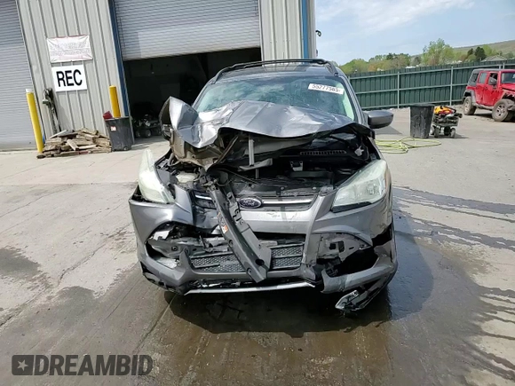 2014 Ford Escape SE с VIN 1FMCU9G97EUD93503, выставлен на аукционе Copart как лот 55277565 с пробегом Не указан миль и Списание • Salvage title. История ставок и продаж доступна на DreamBid. Изображение 14.