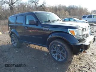 2007 Dodge Nitro SLT with VIN 1D8GT58K47W560542, listed as a IAAI auction lot 41218781 with 151,328 mi miles. Bid and sale history available at carsss.com. Image 1.