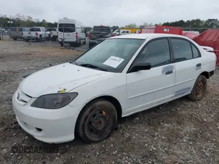 2004 Honda Civic VP with VIN 2HGES16334H611425, listed as a IAAI auction lot 41909272 with 196,304 mi miles. Bid and sale history available at carsss.com. Image 2.
