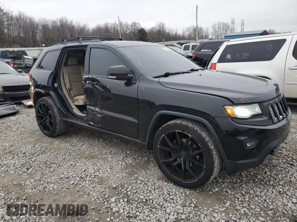2014 Jeep Grand Cherokee Limited with VIN 1C4RJEBT5EC213332, listed as a Copart auction lot 87583515 with 152,409 mi miles and Salvage Title. Bid and sale history available at DreamBid. Image 4.