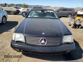 1999 Mercedes-Benz SL-Class with VIN WDBFA68F8XF186072, listed as a Copart auction lot 69557094 with 99,691 mi miles and Salvage Title. Bid and sale history available at carsss.com. Image 5.