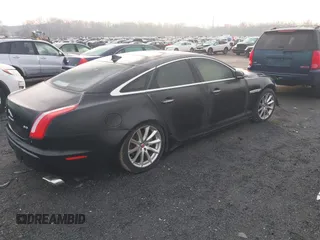 2014 Jaguar XJ with VIN SAJWA1CZXE8V74400, listed as a IAAI auction lot 38250698 with 102,205 mi miles and . Bid and sale history available at DreamBid. Image 4.