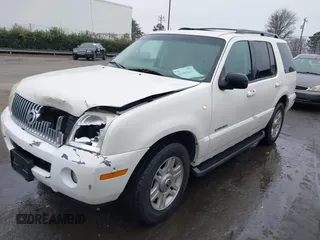 2002 Mercury Mountaineer Convenience z VIN 4M2ZU86W12ZJ35003, wystawiony jako IAAI lot #41193635 z przebiegiem 168 601 mil mil oraz . Historia ofert i sprzedaży dostępna na DreamBid. Obrazek 17.