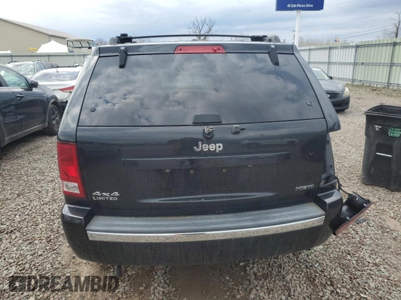 2009 Jeep Grand Cherokee Limited with VIN 1J8HR58T99C537829, listed as a Copart auction lot 54052545 with 256,855 mi miles and Clean title. Bid and sale history available at DreamBid. Image 6.
