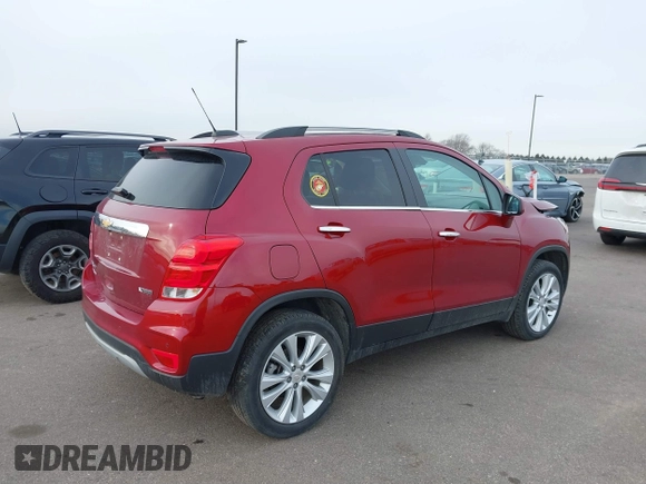 2018 Chevrolet Trax Premier with VIN 3GNCJRSBXJL245395, listed as a IAAI auction lot 41261014 with 27,306 mi miles. Bid and sale history available at carsss.com. Image 4.