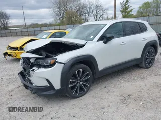 2023 Mazda CX-50 S Premium Plus with VIN 7MMVABEM7PN108865, listed as a IAAI auction lot 42049215 with 33,285 mi miles and . Bid and sale history available at DreamBid. Image 17.