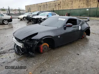 2016 Nissan 370Z Nismo z VIN JN1AZ4EH7GM937143, wystawiony jako Copart lot #51957325 z przebiegiem Nie podano mil oraz Szkoda całkowita • Salvage title. Historia ofert i sprzedaży dostępna na DreamBid. Obrazek 1.