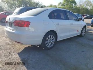 2012 Volkswagen Jetta Sedan SE w/Convenience & Sunroof with VIN 3VWDX7AJ4CM386885, listed as a IAAI auction lot 42052411 with 328,232 mi miles. Bid and sale history available at carsss.com. Image 4.