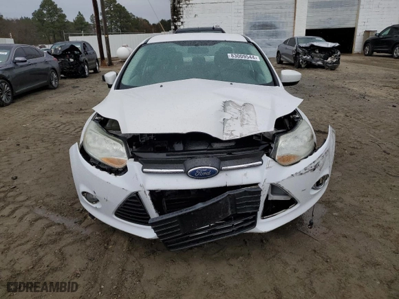 2012 Ford Focus SE with VIN 1FAHP3F21CL298964, listed as a Copart auction lot 83009544 with 140,656 mi miles and Salvage Title. Bid and sale history available at carsss.com. Image 5.