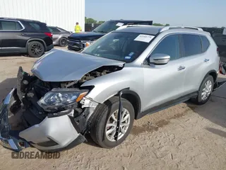 2019 Nissan Rogue SV with VIN KNMAT2MT0KP527901, listed as a IAAI auction lot 42260779 with 102,975 mi miles and . Bid and sale history available at DreamBid. Image 2.