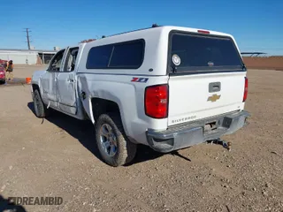 2015 Chevrolet Silverado 1500 LT with VIN 1GCVKREC7FZ209330, listed as a IAAI auction lot 40986703 with 139,383 mi miles. Bid and sale history available at carsss.com. Image 3.