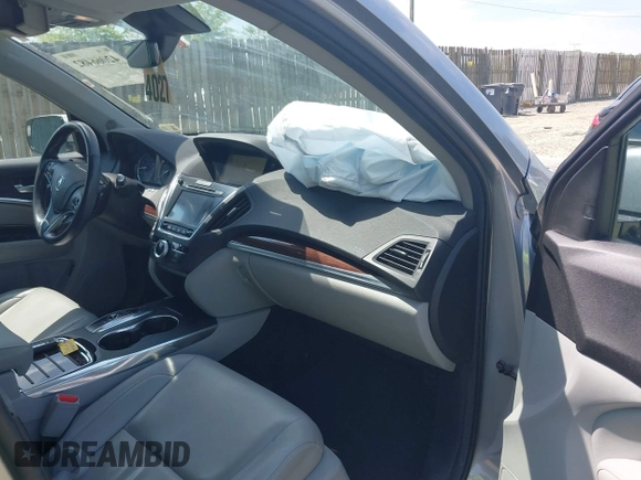 2016 Acura MDX w/Tech with VIN 5FRYD4H41GB048803, listed as a IAAI auction lot 42066482 with 105,435 mi miles. Bid and sale history available at carsss.com. Image 5.