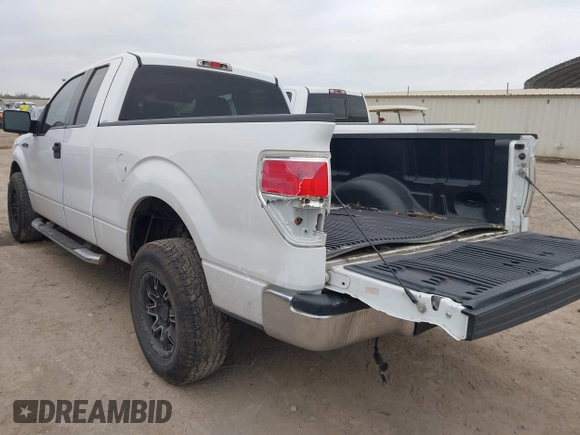 2009 Ford F-150 STX with VIN 1FTRX12819FA25009, listed as a IAAI auction lot 41468579 with 161,763 mi miles. Bid and sale history available at carsss.com. Image 3.