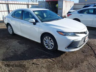 2023 Toyota Camry LE with VIN 4T1C11AK6PU181720, listed as a IAAI auction lot 41423643 with 42,610 mi miles. Bid and sale history available at carsss.com. Image 1.
