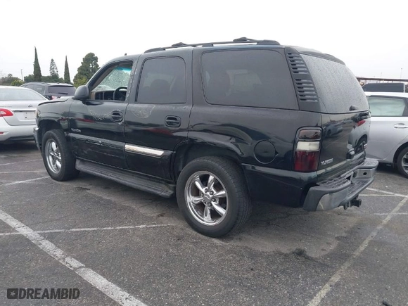 2006 GMC Yukon SLT with VIN 1GKEC13V46R138398, listed as a IAAI auction lot 41778033 with 158,568 mi miles. Bid and sale history available at carsss.com. Image 3.