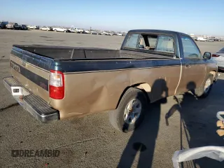 1993 Toyota T100 z VIN JT4VD10C2P0007486, wystawiony jako Copart lot #77669724 z przebiegiem 150 936 mil mil oraz Tytuł czysty. Historia ofert i sprzedaży dostępna na DreamBid. Obrazek 3.