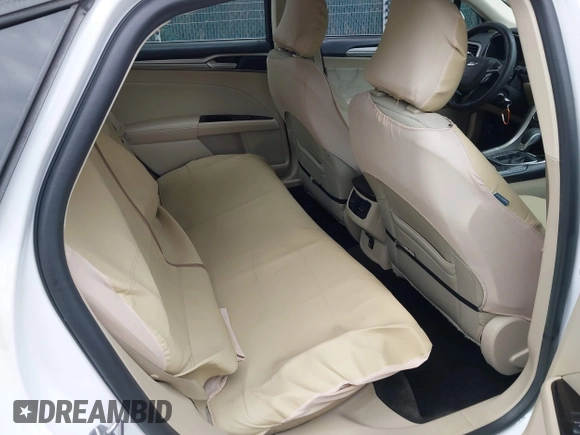 2016 Ford Fusion SE z VIN 3FA6P0H74GR197892, wystawiony jako IAAI lot #42471574 z przebiegiem 185 224 mil mil oraz . Historia ofert i sprzedaży dostępna na DreamBid. Obrazek 8.