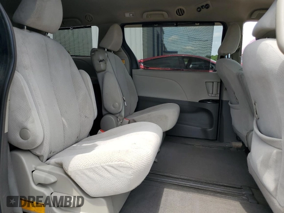 2012 Toyota Sienna LE AAS с VIN 5TDKK3DC4CS218114, выставлен на аукционе Copart как лот 56473025 с пробегом 214 865 миль миль и Списание • Salvage title. История ставок и продаж доступна на DreamBid. Изображение 11.
