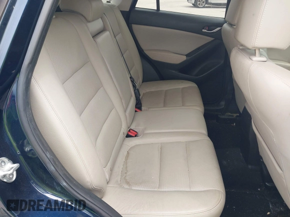 2014 Mazda CX-5 Grand Touring with VIN JM3KE2DY8E0425258, listed as a IAAI auction lot 42179452 with 132,137 mi miles. Bid and sale history available at carsss.com. Image 8.