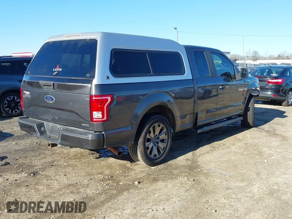 2015 Ford F-150 XL with VIN 1FTEX1C85FKD46390, listed as a IAAI auction lot 41367960 with 209,889 mi miles. Bid and sale history available at carsss.com. Image 4.