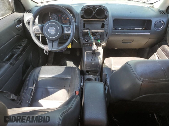 2014 Jeep Patriot High Altitude with VIN 1C4NJPFAXED758133, listed as a Copart auction lot 48975185 with 193,633 mi miles and Salvage Title. Bid and sale history available at carsss.com. Image 8.