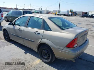 2004 Ford Focus z VIN 1FAFP33Z24W149701, wystawiony jako IAAI lot #42360188 z przebiegiem 152 415 mil mil oraz . Historia ofert i sprzedaży dostępna na DreamBid. Obrazek 3.