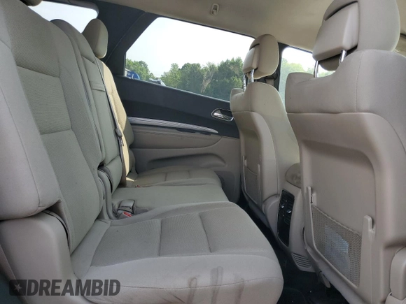 2014 Dodge Durango SXT with VIN 1C4RDJAG8EC495227, listed as a Copart auction lot 63550295 with 359,835 mi miles and Salvage title. Bid and sale history available at DreamBid. Image 11.