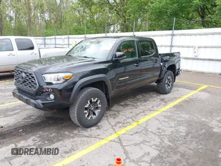 2021 Toyota Tacoma SR with VIN 3TMCZ5AN0MM417261, listed as a IAAI auction lot 42240693 with 38,625 mi miles and . Bid and sale history available at DreamBid. Image 23.