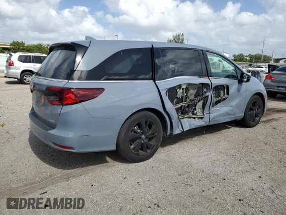 2023 Honda Odyssey Sport with VIN 5FNRL6H71PB068791, listed as a Copart auction lot 77479764 with 15,667 mi miles and Salvage Title. Bid and sale history available at carsss.com. Image 3.