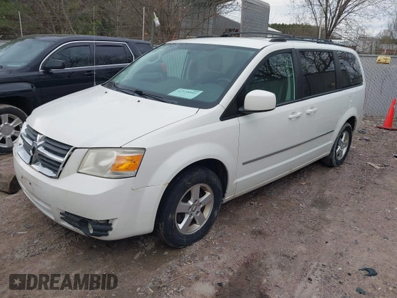 2010 Dodge Grand Caravan SXT with VIN 2D4RN5D17AR408112, listed as a IAAI auction lot 42128842 with 173,862 mi miles and . Bid and sale history available at DreamBid. Image 2.