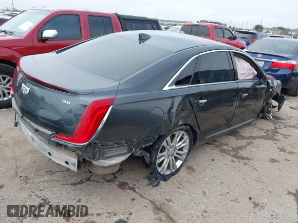 2018 Cadillac XTS Luxury with VIN 2G61M5S30J9164758, listed as a IAAI auction lot 41648265 with 173,134 mi miles and . Bid and sale history available at carsss.com. Image 4.