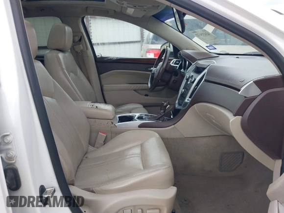2012 Cadillac SRX Premium Collection with VIN 3GYFNCE38CS517912, listed as a IAAI auction lot 42435672 with 193,103 mi miles and . Bid and sale history available at DreamBid. Image 5.