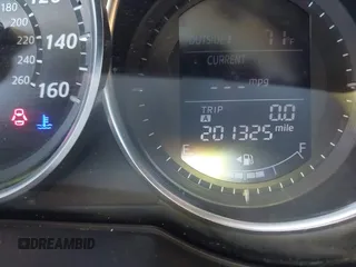 2015 Mazda CX-5 Touring with VIN JM3KE4CY1F0439016, listed as a IAAI auction lot 42039259 with 201,325 mi miles and . Bid and sale history available at carsss.com. Image 15.