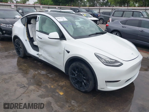 2022 Tesla Model Y Long Range z VIN 7SAYGDEE2NF420882, wystawiony jako IAAI lot #42023642 z przebiegiem 19 783 mil mil oraz . Historia ofert i sprzedaży dostępna na DreamBid. Obrazek 1.