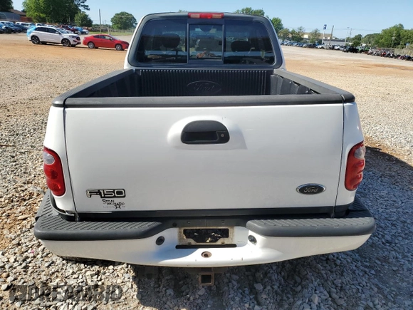 2003 Ford F-150 XL with VIN 1FTRX07W03KD12910, listed as a Copart auction lot 57864555 with Not provided miles and Salvage title. Bid and sale history available at DreamBid. Image 6.
