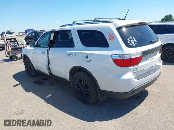 2013 Dodge Durango Crew with VIN 1C4RDJDG8DC664544, listed as a IAAI auction lot 42608957 with 202,564 mi miles and . Bid and sale history available at DreamBid. Image 3.