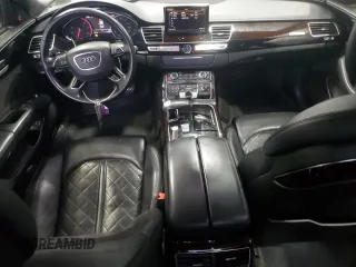 2017 Audi A8 Sport z VIN WAU43AFD4HN020515, wystawiony jako Copart lot #44953055 z przebiegiem 115 422 mil mil oraz Szkody całkowita. Historia ofert i sprzedaży dostępna na DreamBid. Obrazek 8.